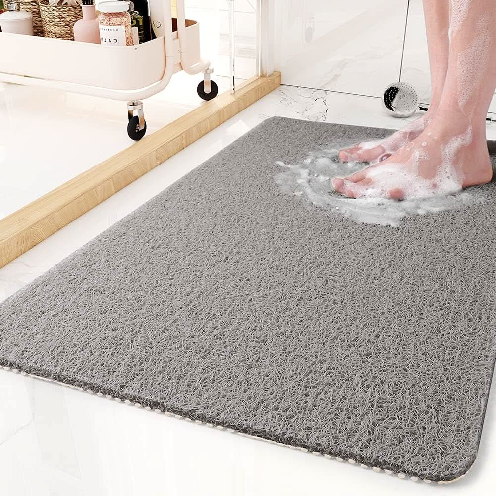 Alfombra antideslizante para ducha con sistema de drenaje