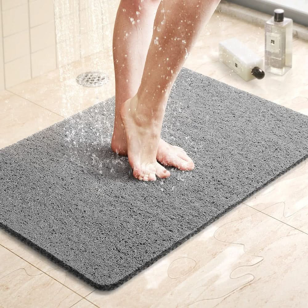 Alfombra antideslizante para ducha con sistema de drenaje