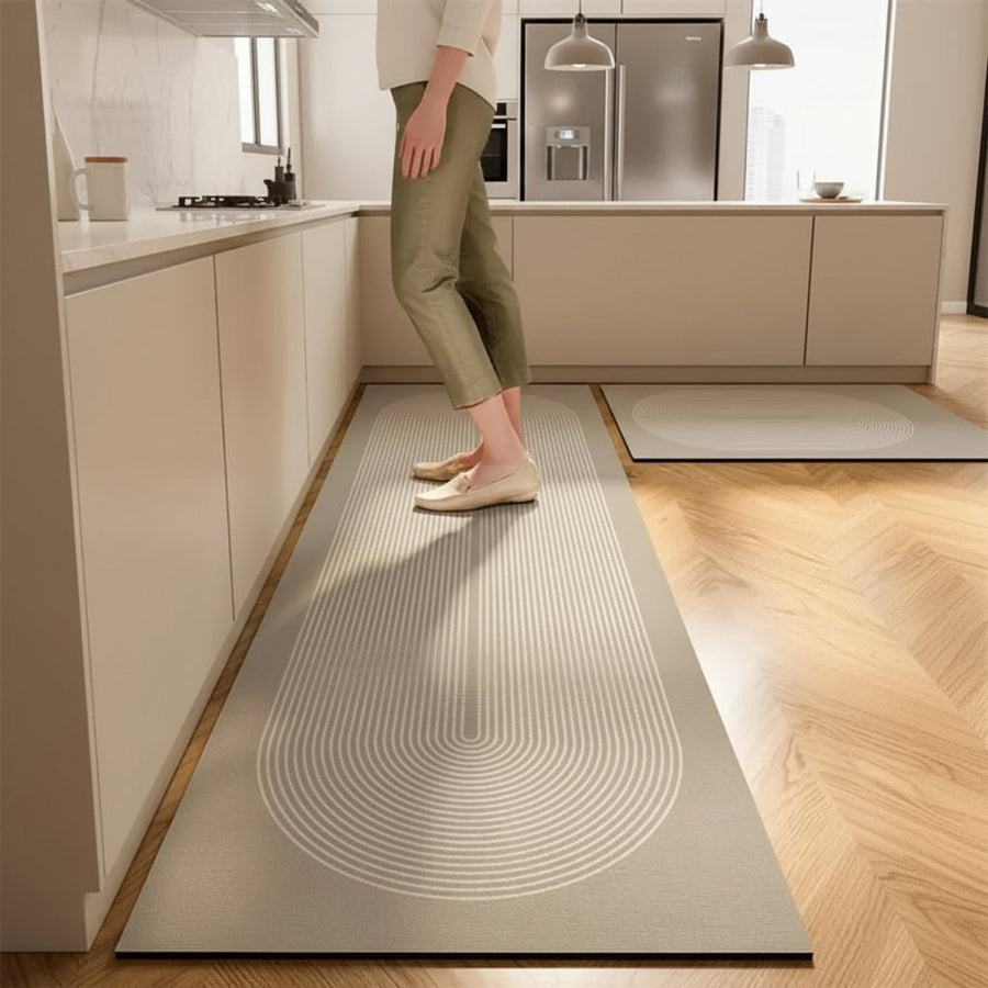 Alfombra de cocina anatómica antifatiga con superficie absorbente y antideslizante