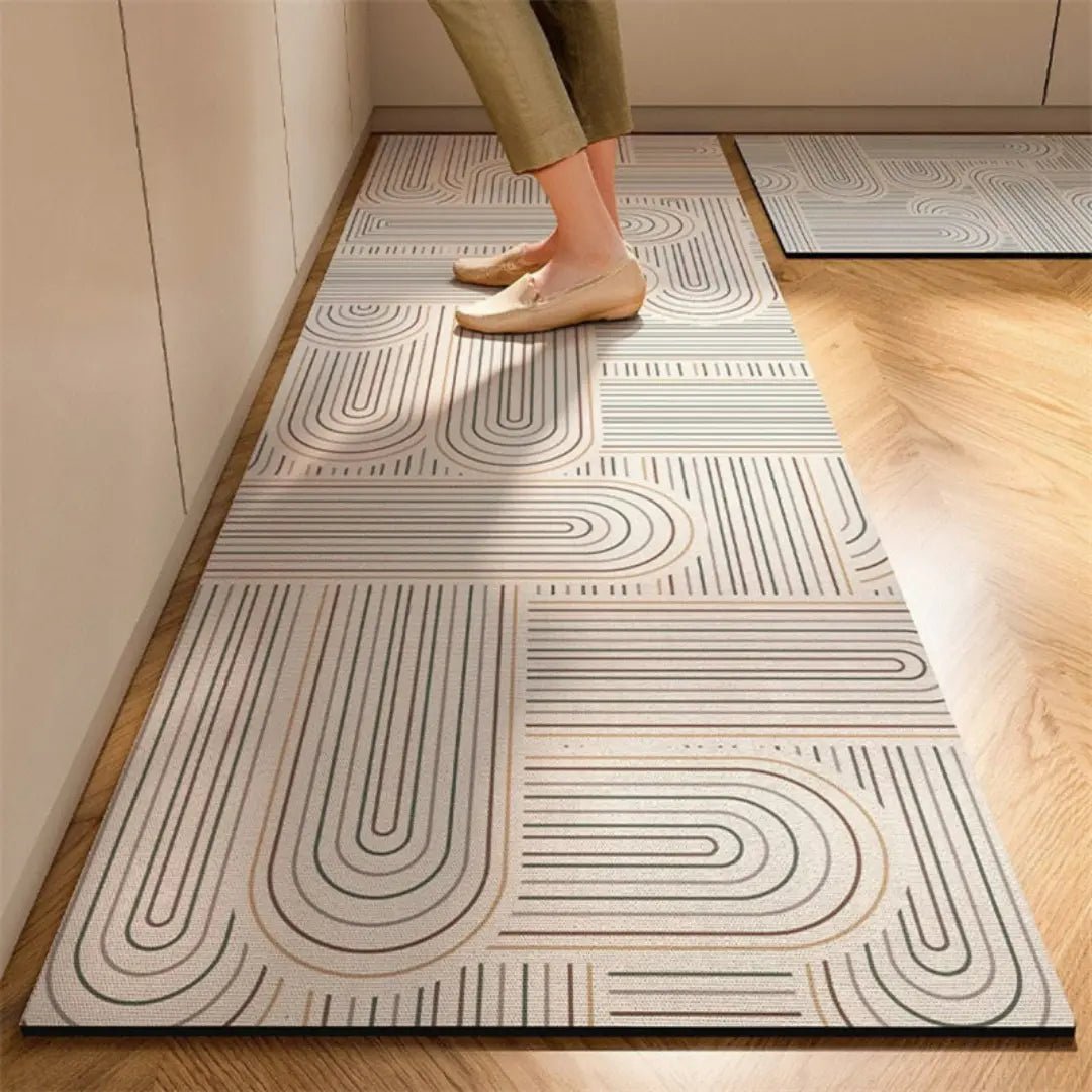 Alfombra de cocina anatómica antifatiga con superficie absorbente y antideslizante