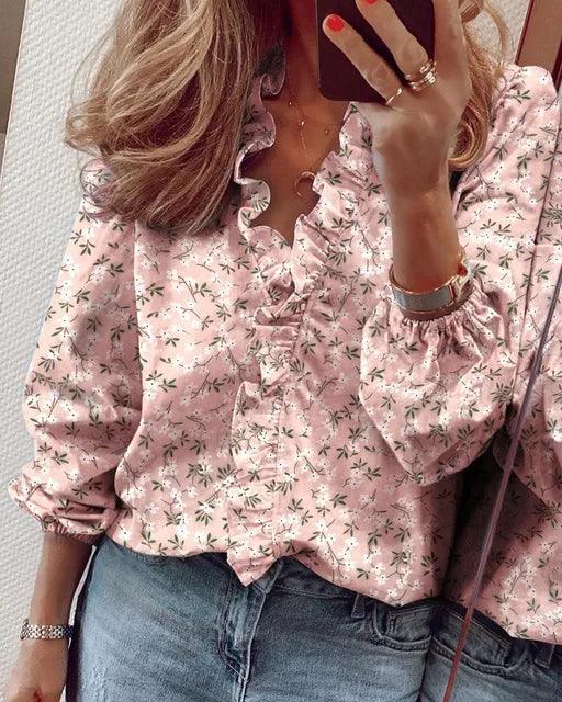 Blusa de mujer con volantes y manga larga