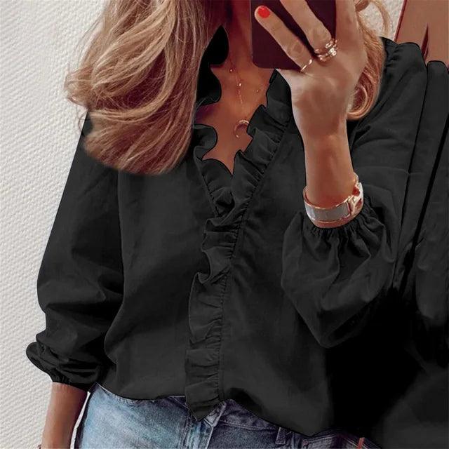 Blusa de mujer con volantes y manga larga
