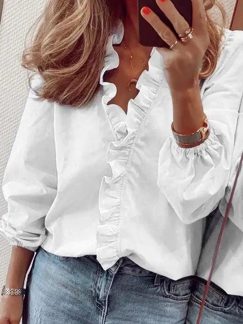 Blusa de mujer con volantes y manga larga