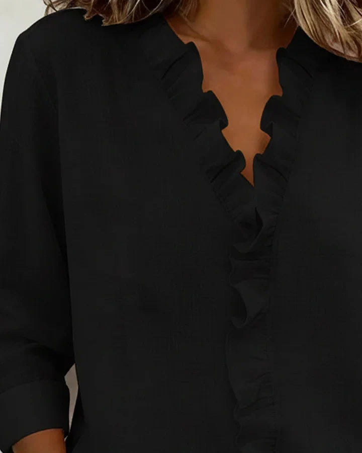 Blusa de mujer de manga larga con cuello en V y volantes