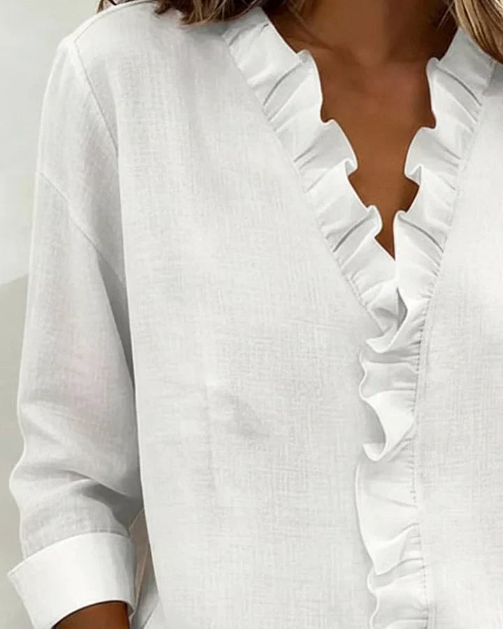 Blusa de mujer de manga larga con cuello en V y volantes