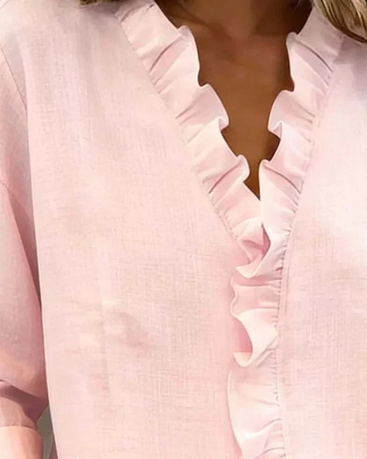 Blusa de mujer de manga larga con cuello en V y volantes