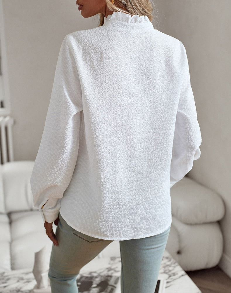 Blusa de mujer de manga larga con volantes