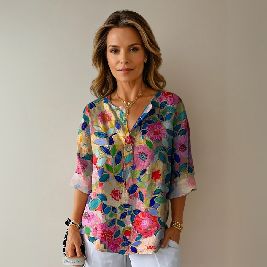 Blusa floral con manga 3/4
