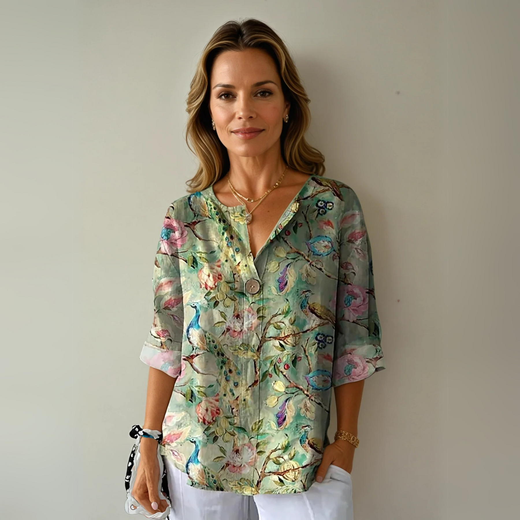 Blusa floral con manga 3/4