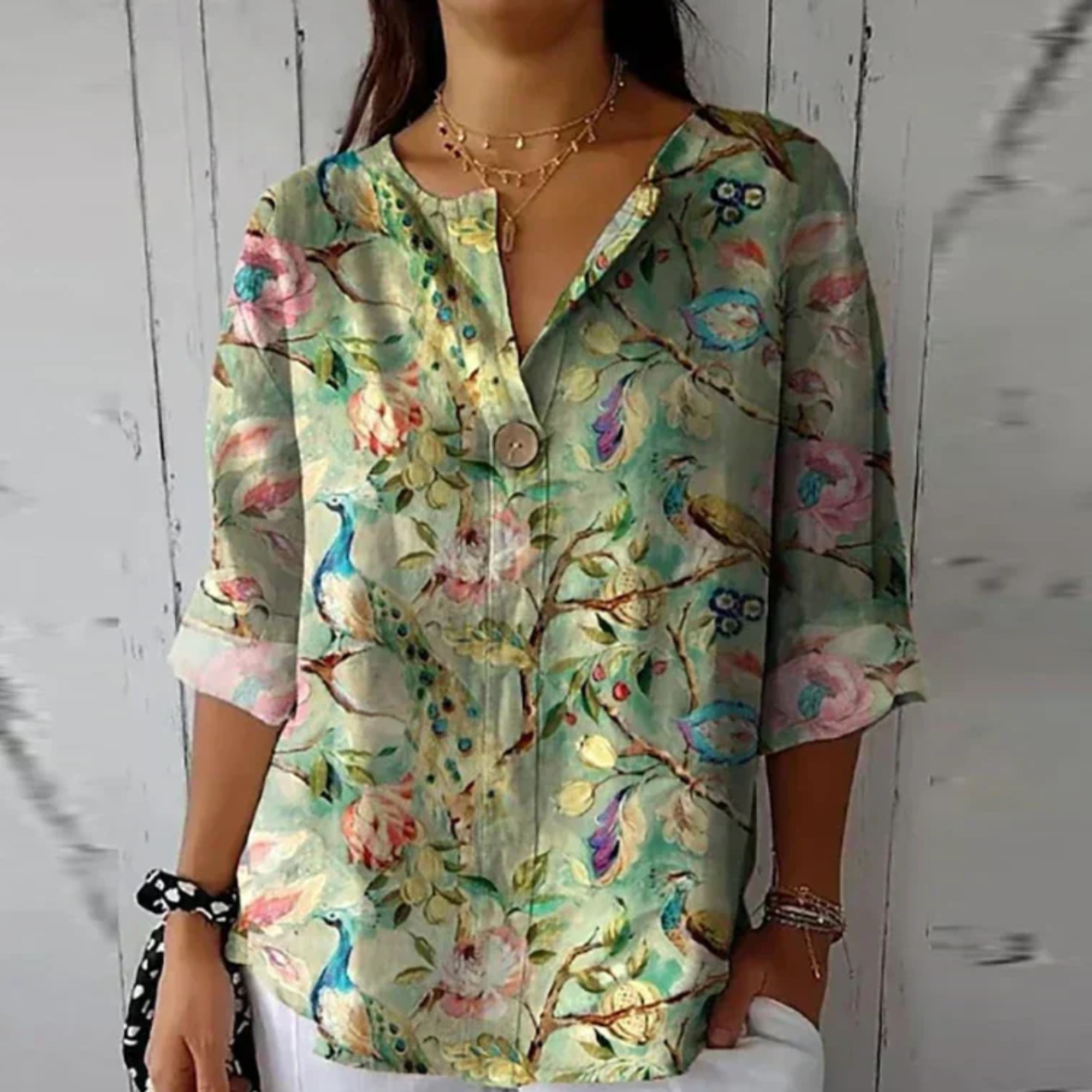 Blusa floral con manga 3/4