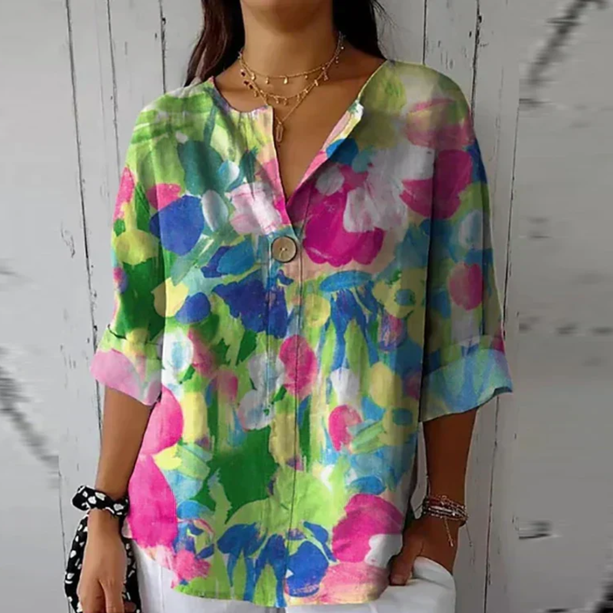 Blusa floral con manga 3/4