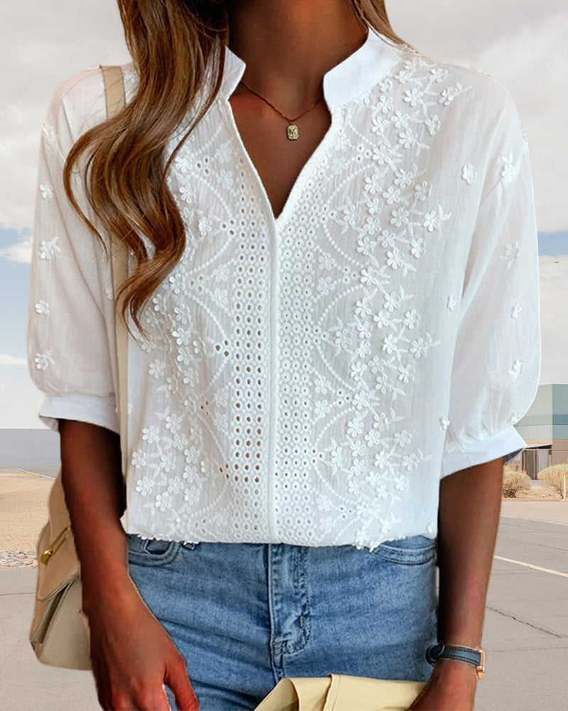 Blusa monocromática de manga corta con cuello en V