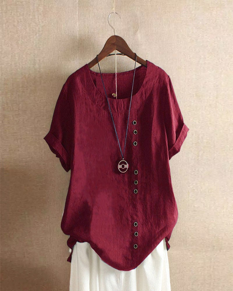 Blusa monocromática de manga corta y cuello redondo