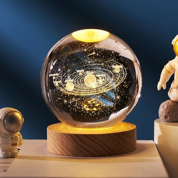 Bola de cristal con planetas en 3D