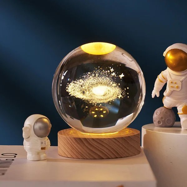 Bola de cristal con planetas en 3D