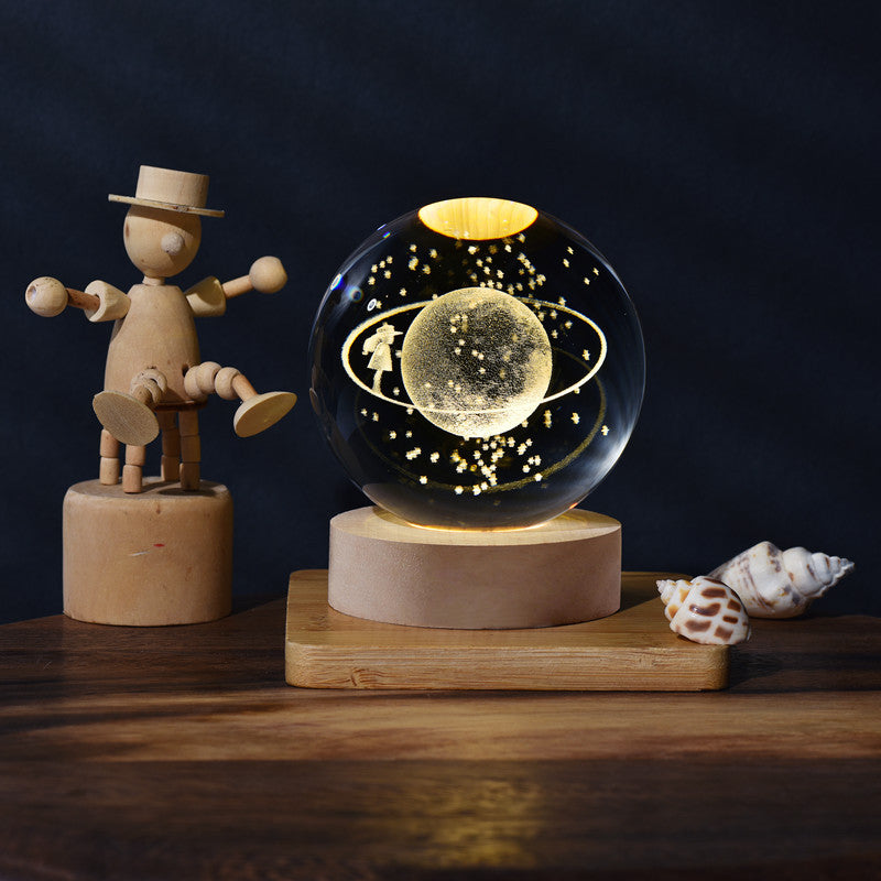 Bola de cristal con planetas en 3D