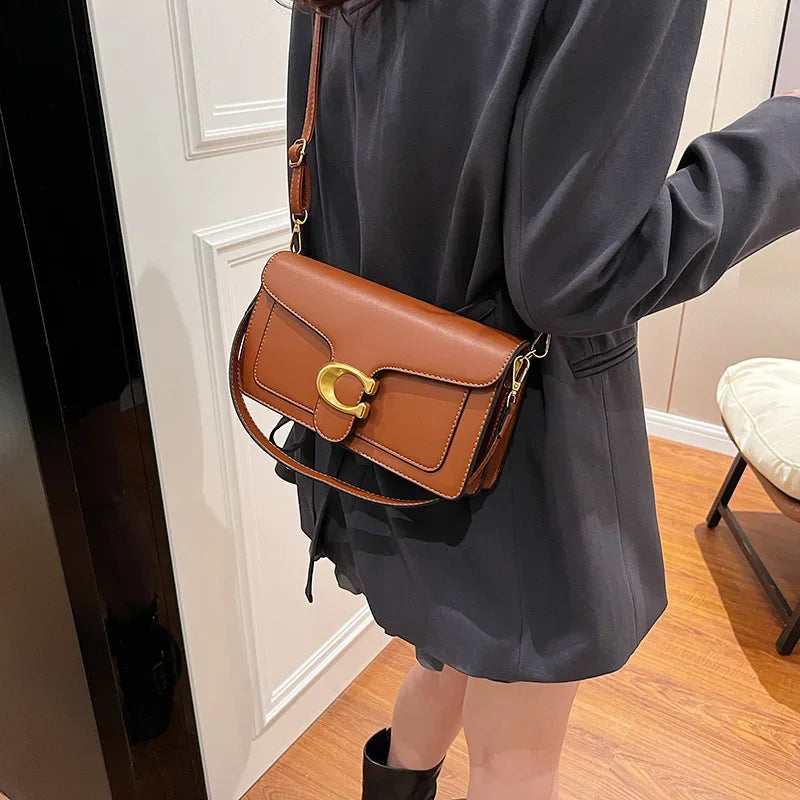 Bolso cuadrado minimalista de hombro y bandolera