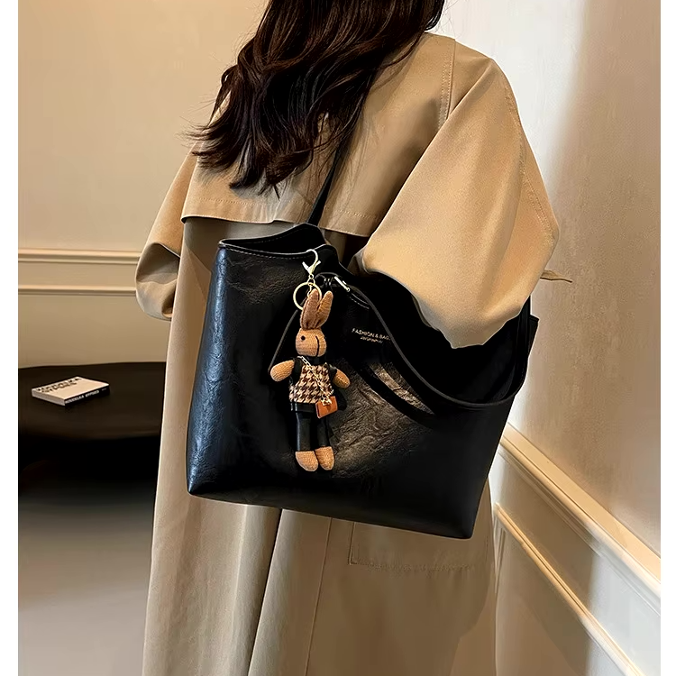 Bolso de hombro espacioso para mujer con dos asas