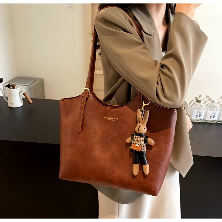 Bolso de hombro espacioso para mujer con dos asas