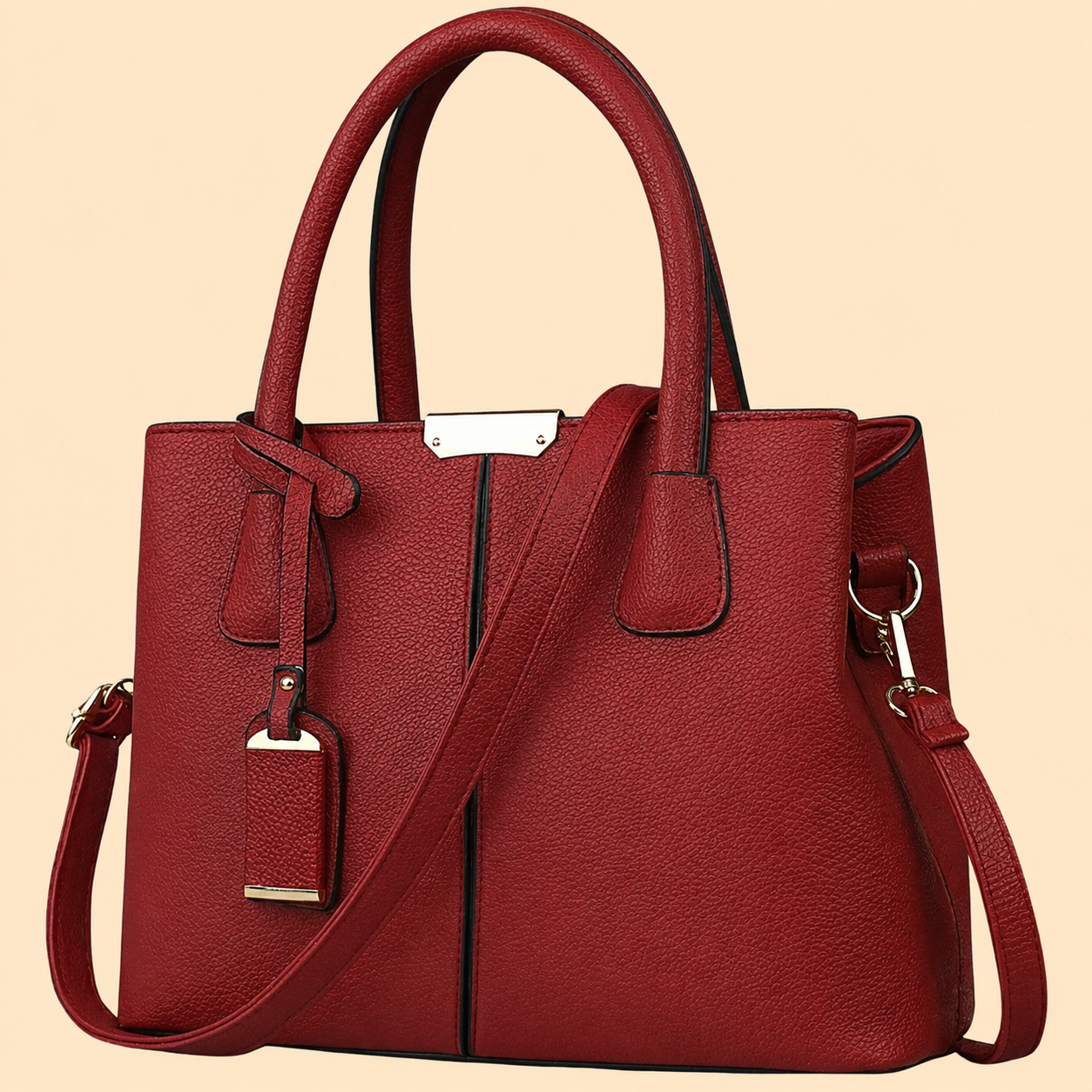 Bolso de mano estructurado con detalle de flecos