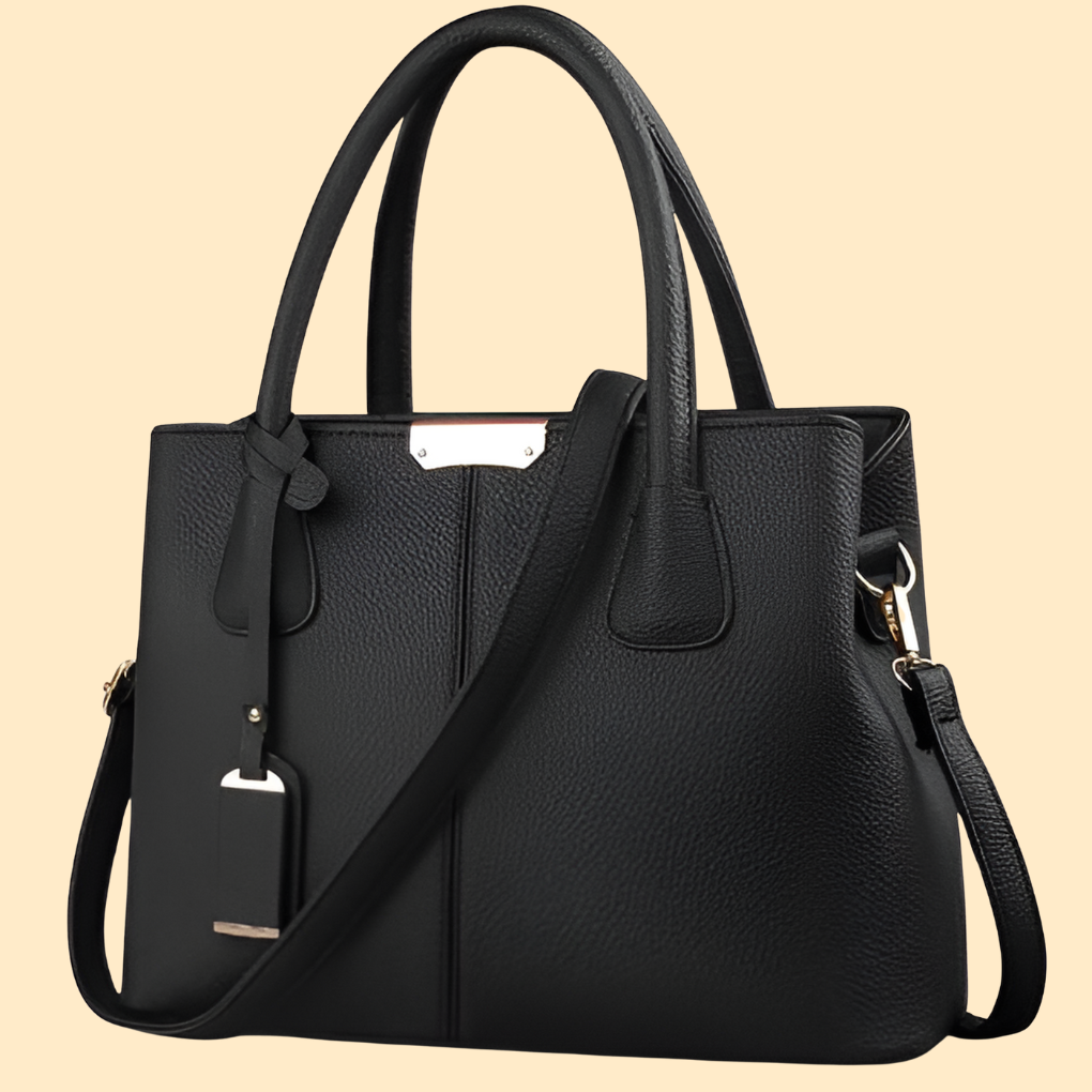 Bolso de mano estructurado con detalle de flecos