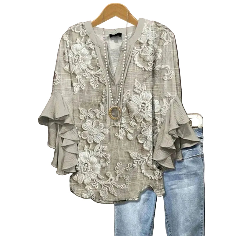 Camiseta para mujer con estampado floral y detalles de volantes