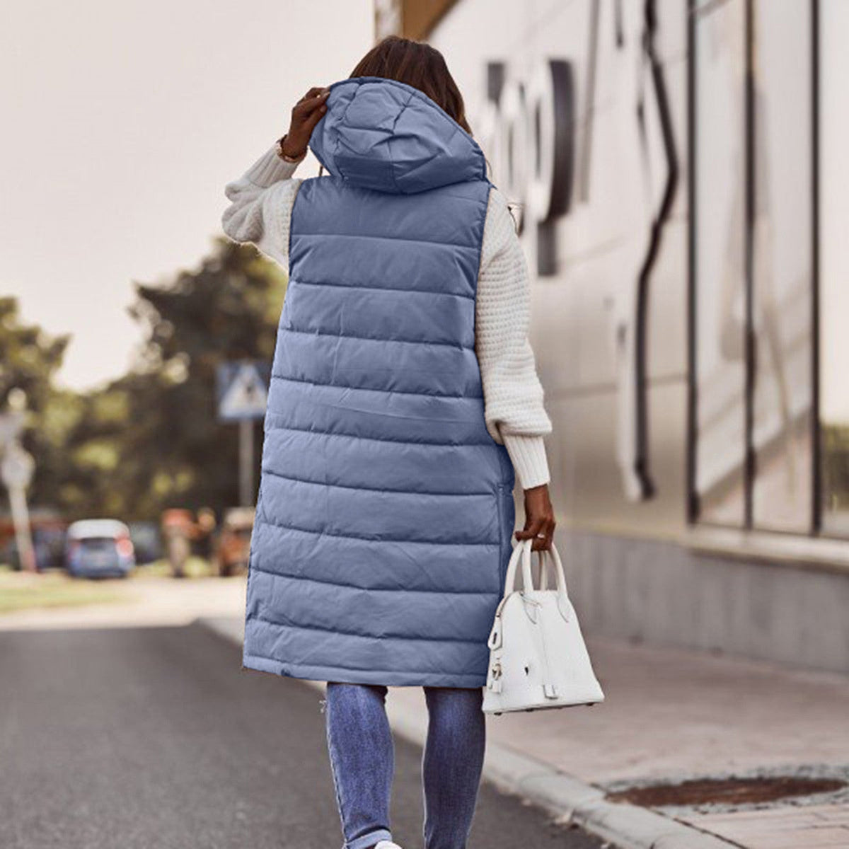 Chaleco acolchado con capucha para mujer