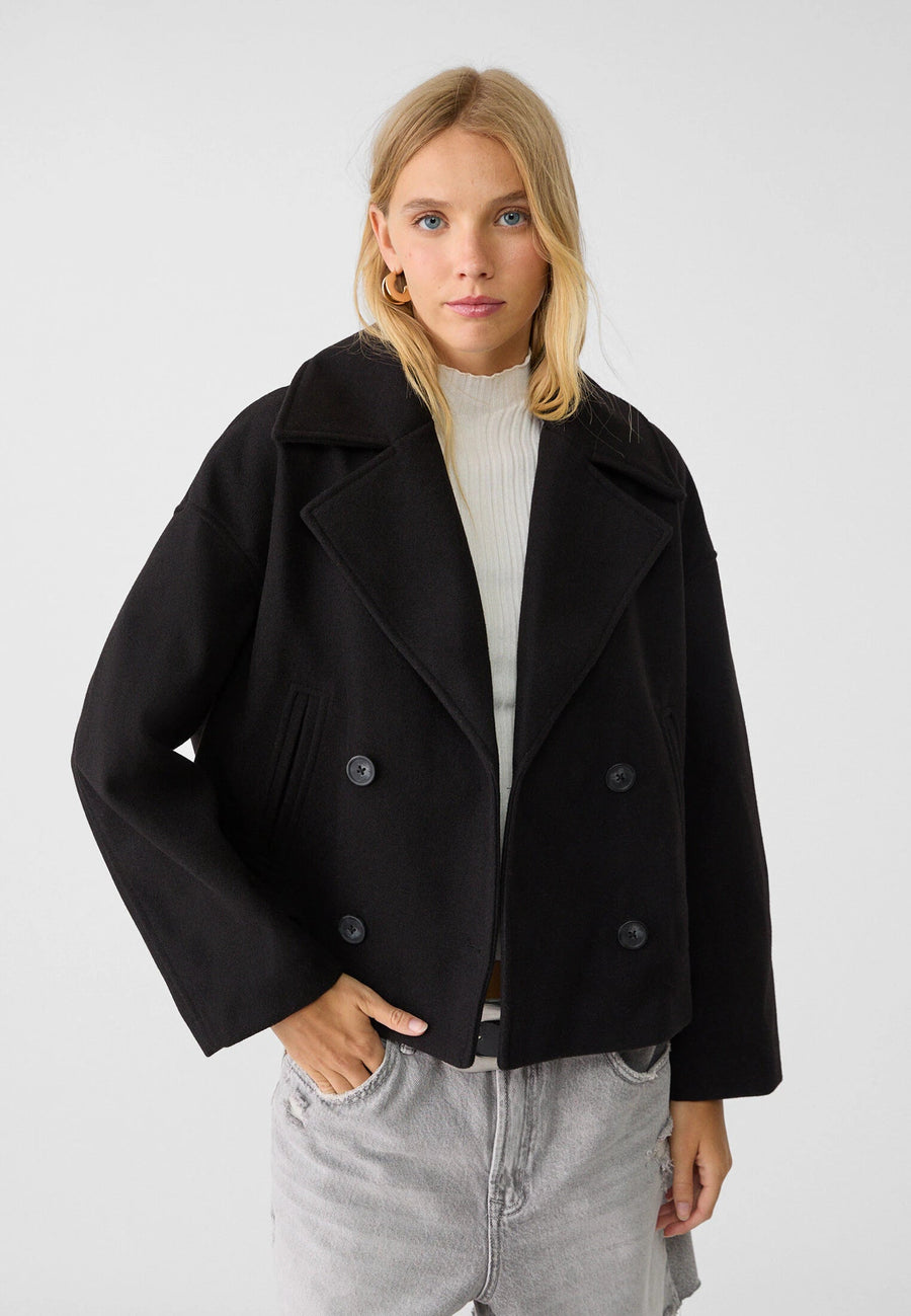 Chaqueta corta con doble abotonadura - Elegante y funcional