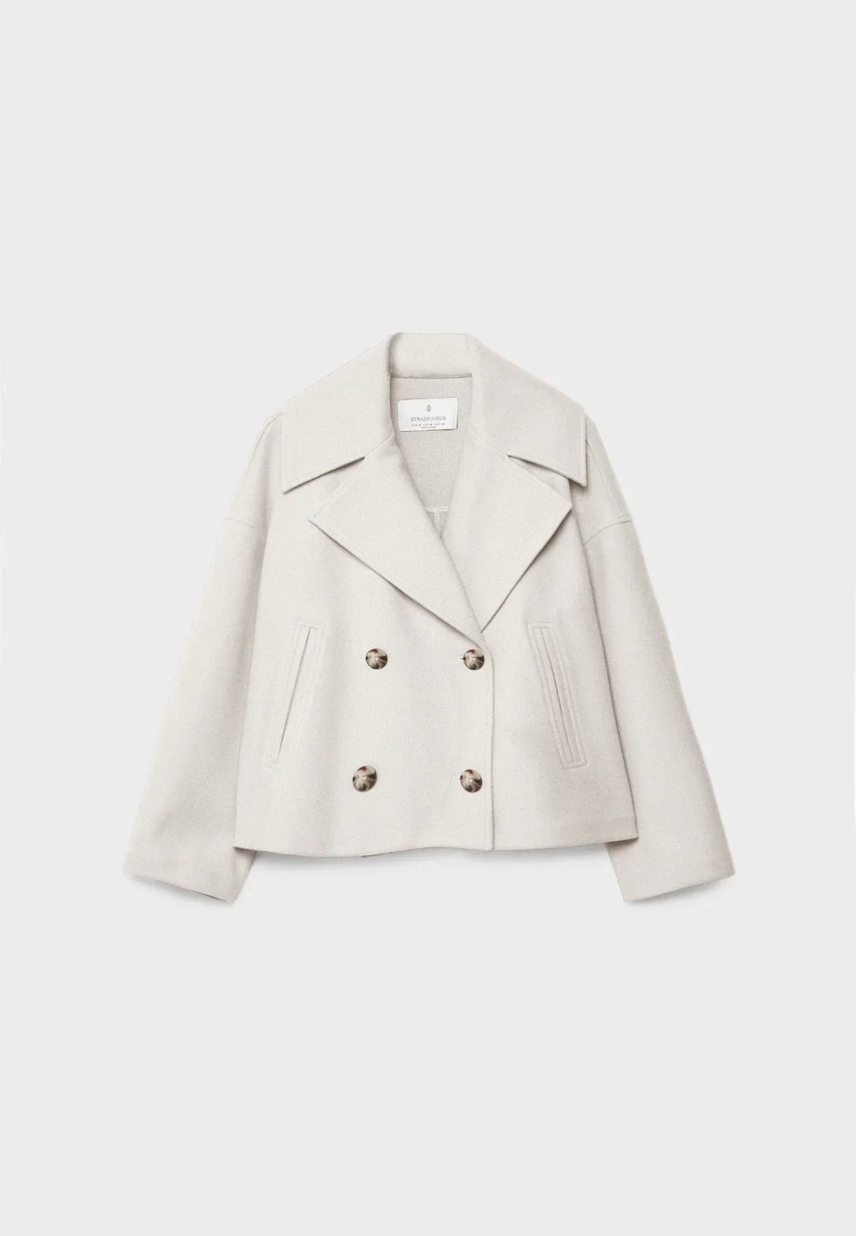 Chaqueta corta cruzada chic - Elegante y atemporal