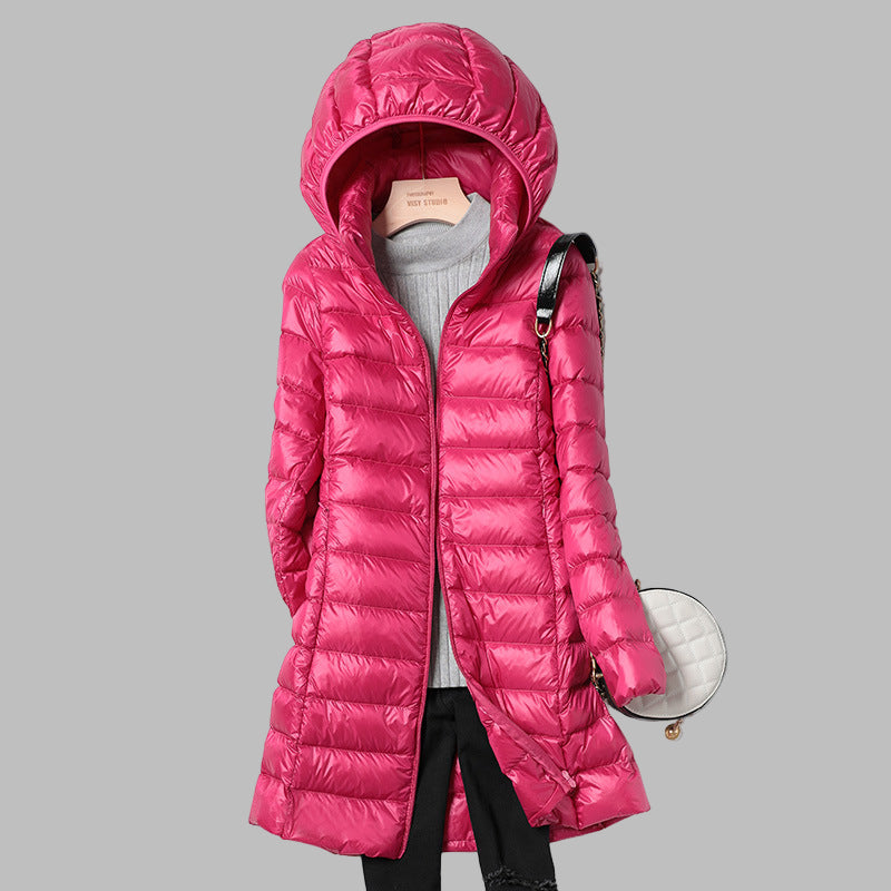 Chaqueta plumífero larga para mujer con capucha extraíble