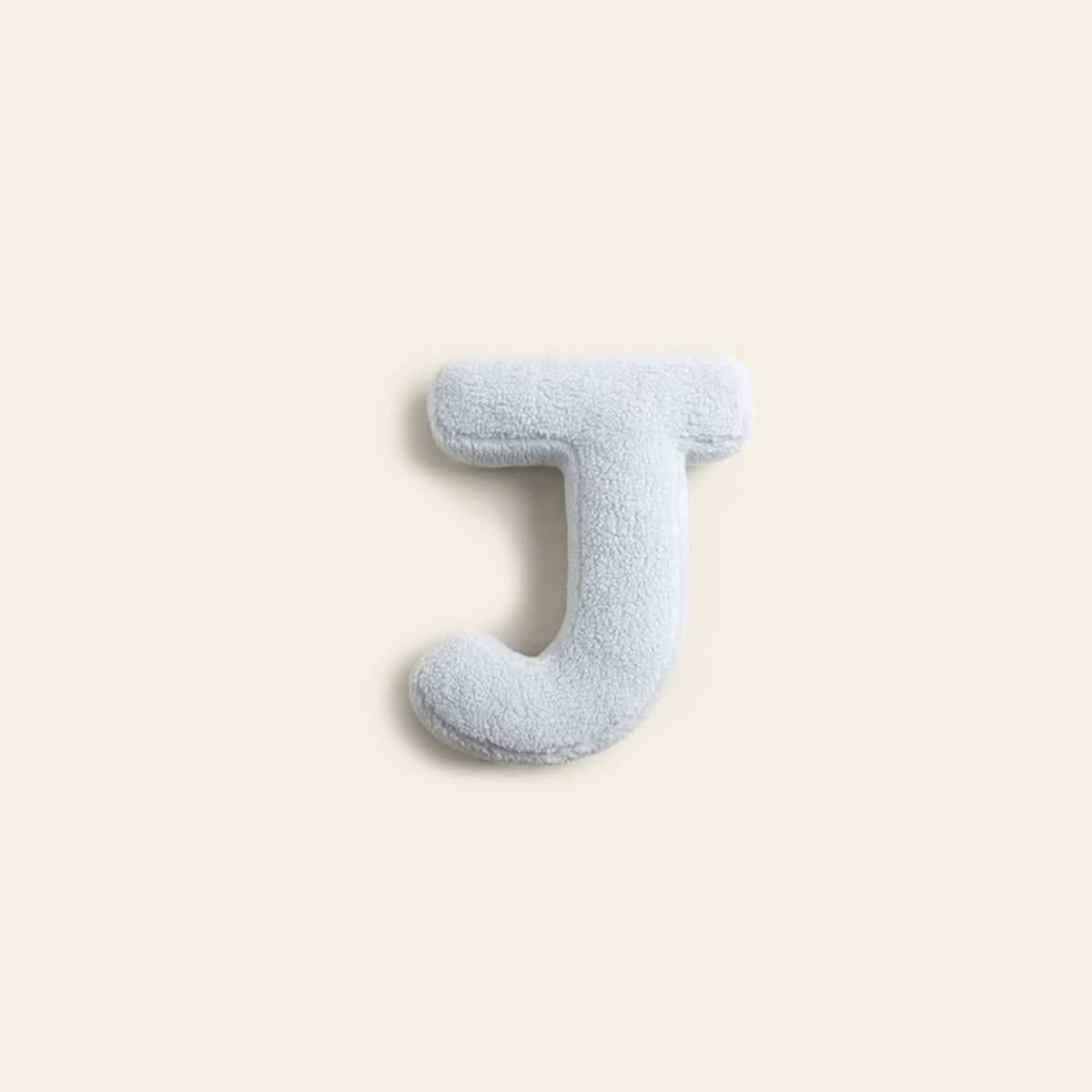 Cojín decorativo personalizado con letra para sofá