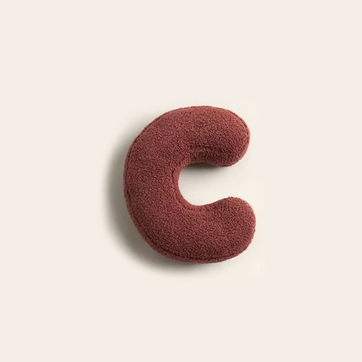Cojín decorativo personalizado con letra para sofá