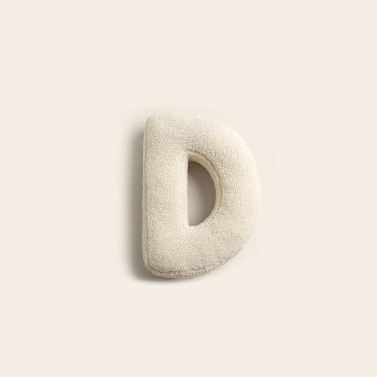 Cojín decorativo personalizado con letra para sofá