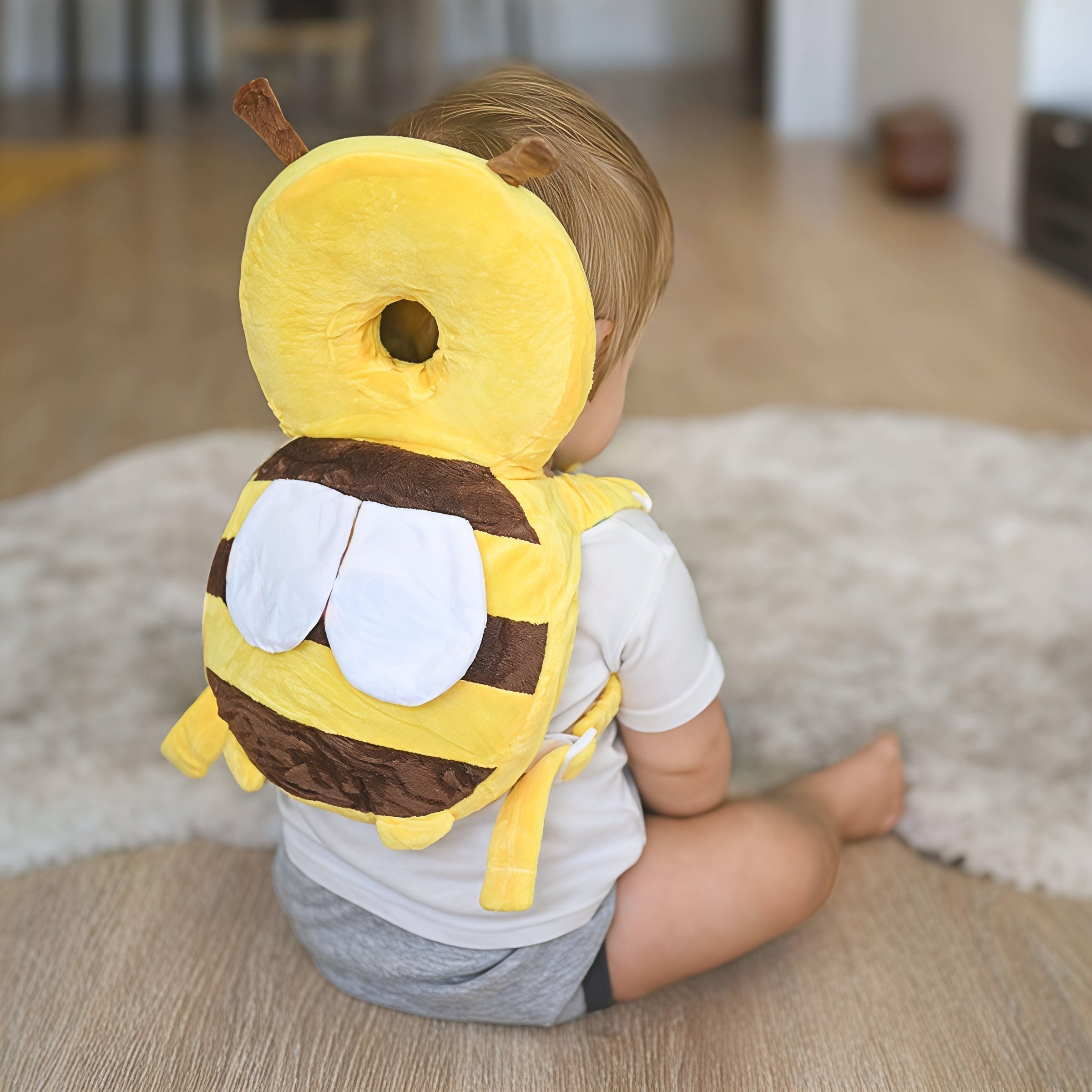 Cojín protector de cabeza para bebé en forma de mochila de seguridad