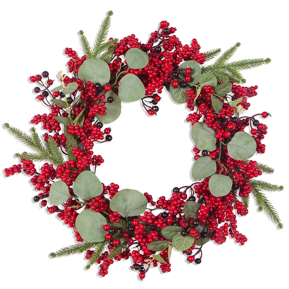 Coronas navideñas con bayas rojas