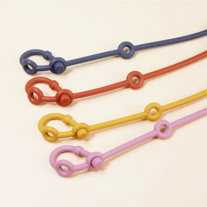 Correas sujetajuguetes de silicona ajustables para un juego seguro