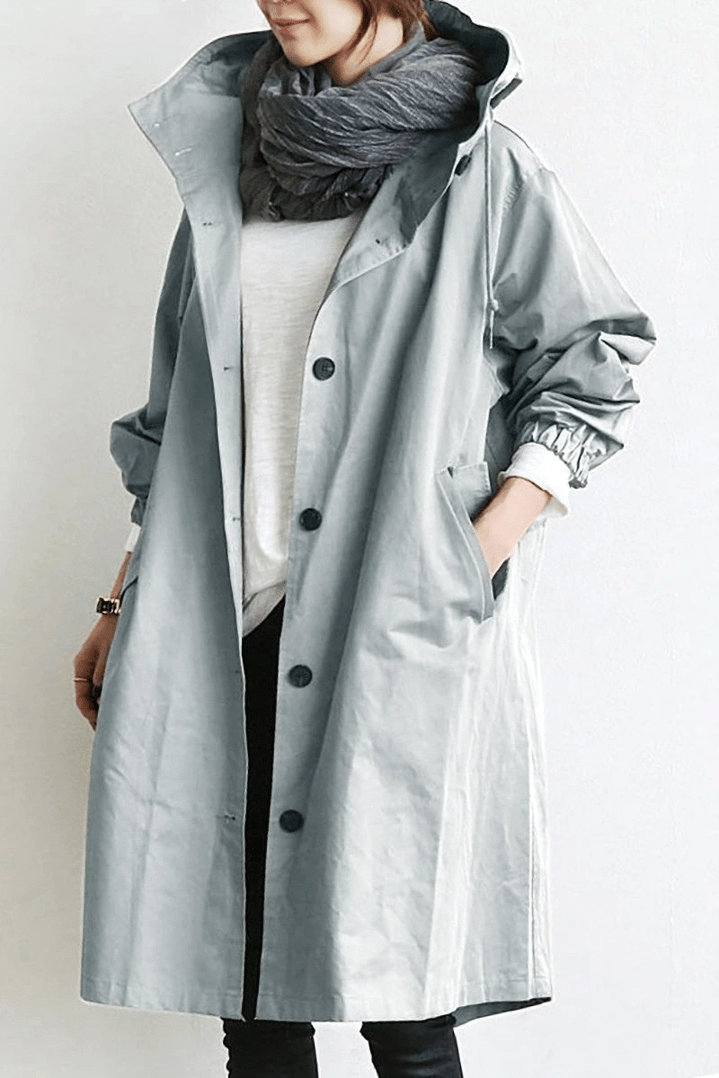 Cortavientos impermeable para mujer con botones y capucha