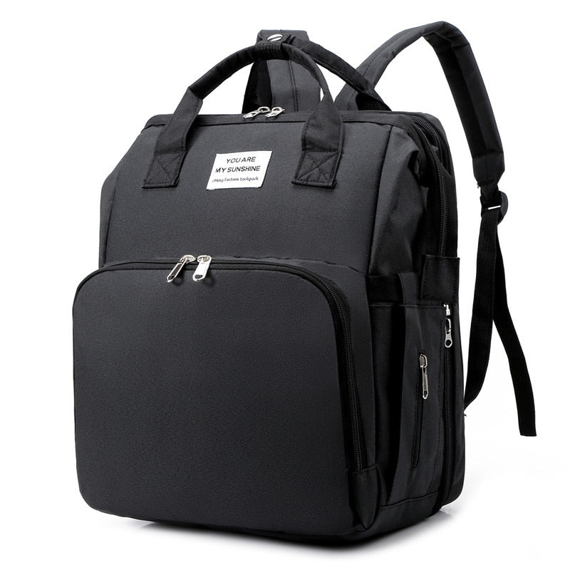 Cuna portátil para bebé y bolso cambiador – Mochila de viaje multifuncional