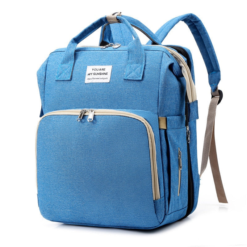 Cuna portátil para bebé y bolso cambiador – Mochila de viaje multifuncional