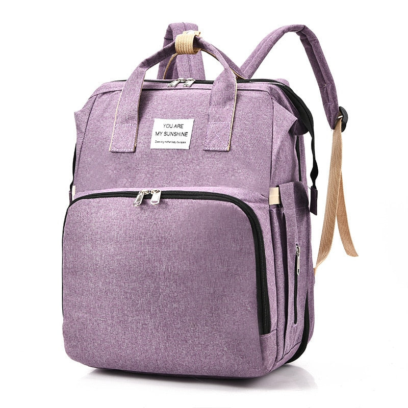Cuna portátil para bebé y bolso cambiador – Mochila de viaje multifuncional