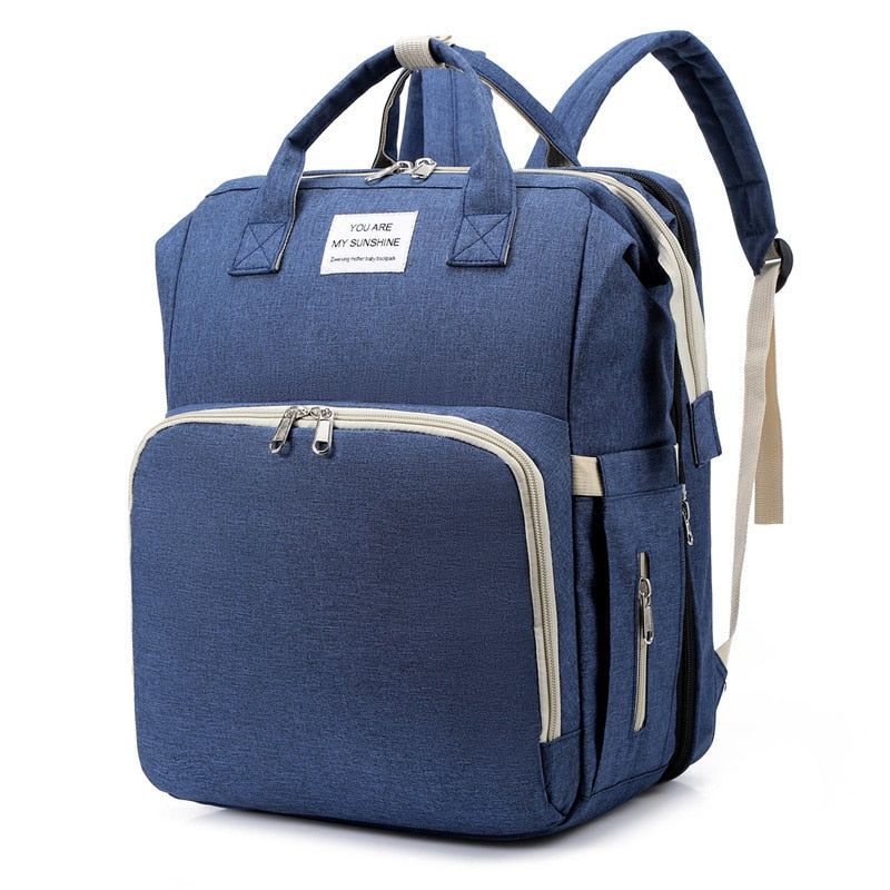 Cuna portátil para bebé y bolso cambiador – Mochila de viaje multifuncional