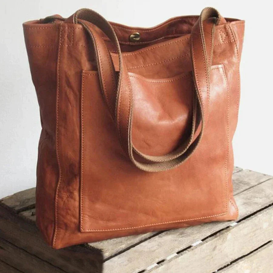 Elegante bolso de mano de piel