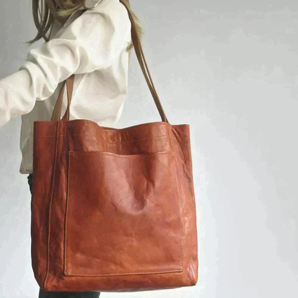 Elegante bolso de mano de piel
