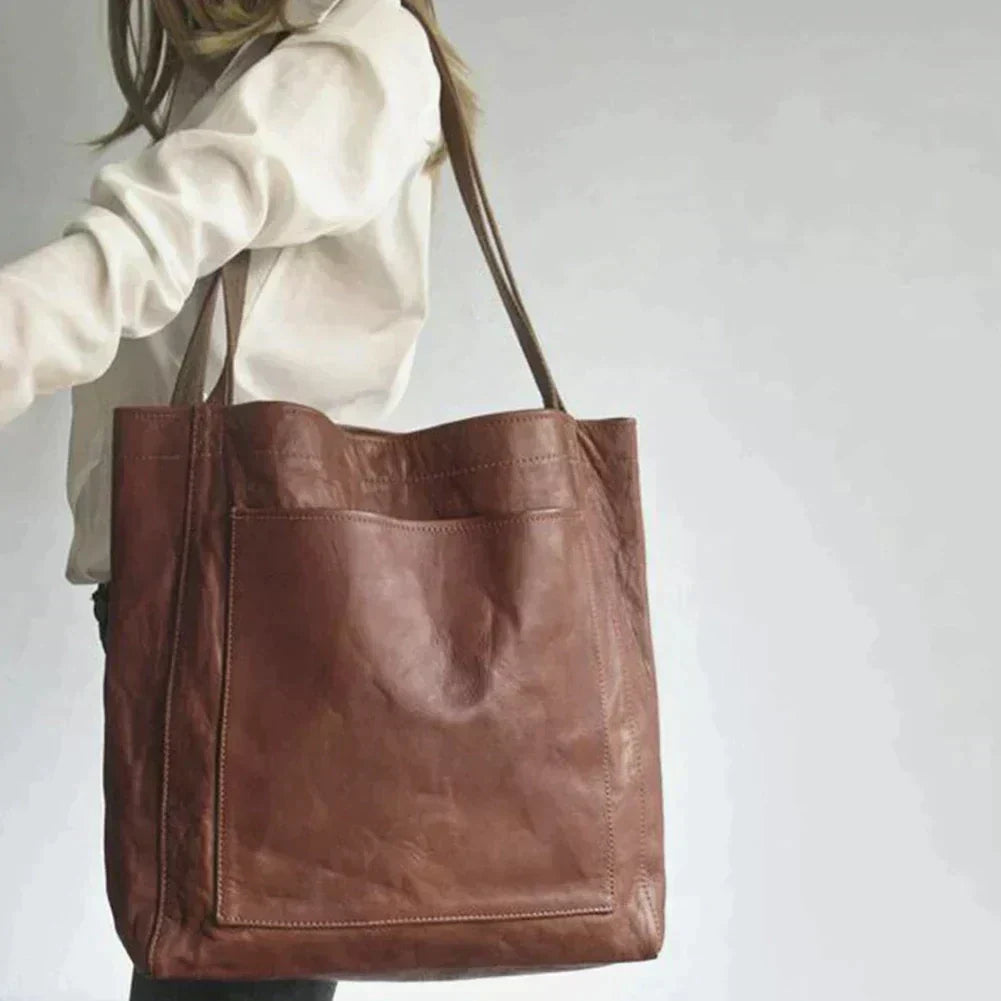 Elegante bolso de mano de piel