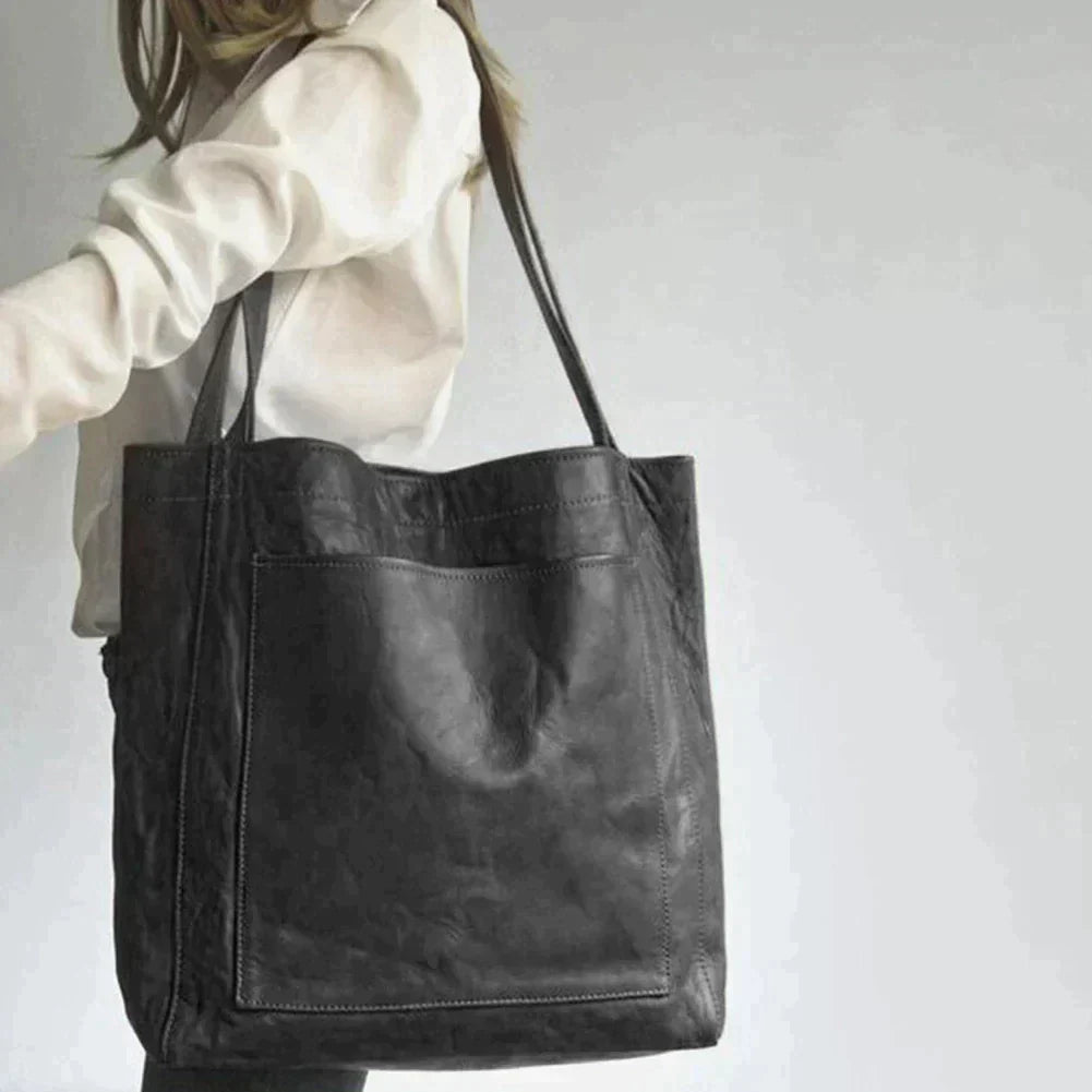 Elegante bolso de mano de piel
