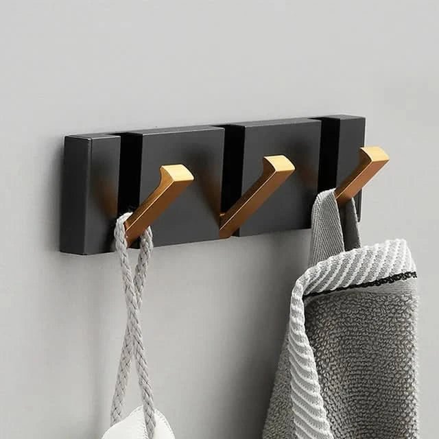 Elegante colgador de pared de acero inoxidable: ahorra espacio y con estilo para cualquier hogar