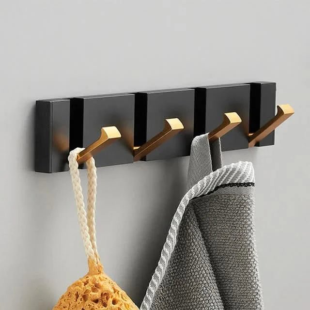 Elegante colgador de pared de acero inoxidable: ahorra espacio y con estilo para cualquier hogar
