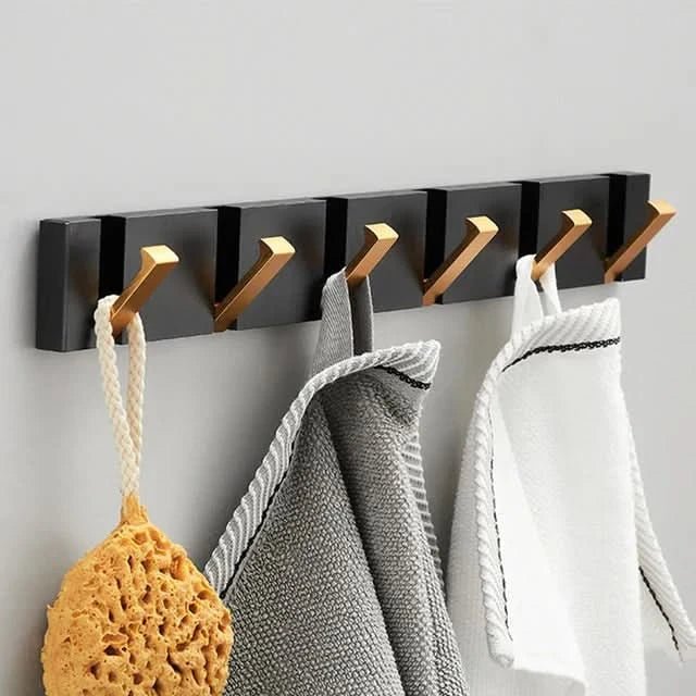 Elegante colgador de pared de acero inoxidable: ahorra espacio y con estilo para cualquier hogar