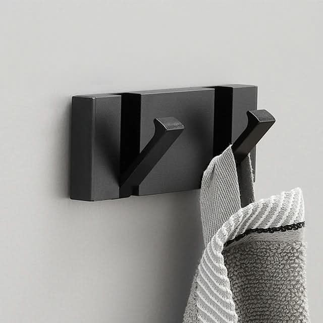 Elegante colgador de pared de acero inoxidable: ahorra espacio y con estilo para cualquier hogar