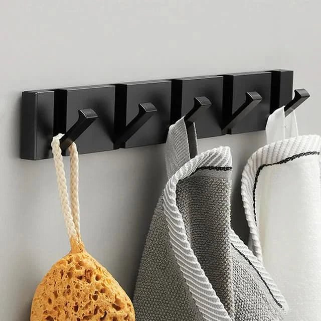Elegante colgador de pared de acero inoxidable: ahorra espacio y con estilo para cualquier hogar